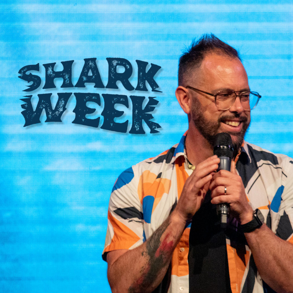 Pastor Corey preaching about sharks