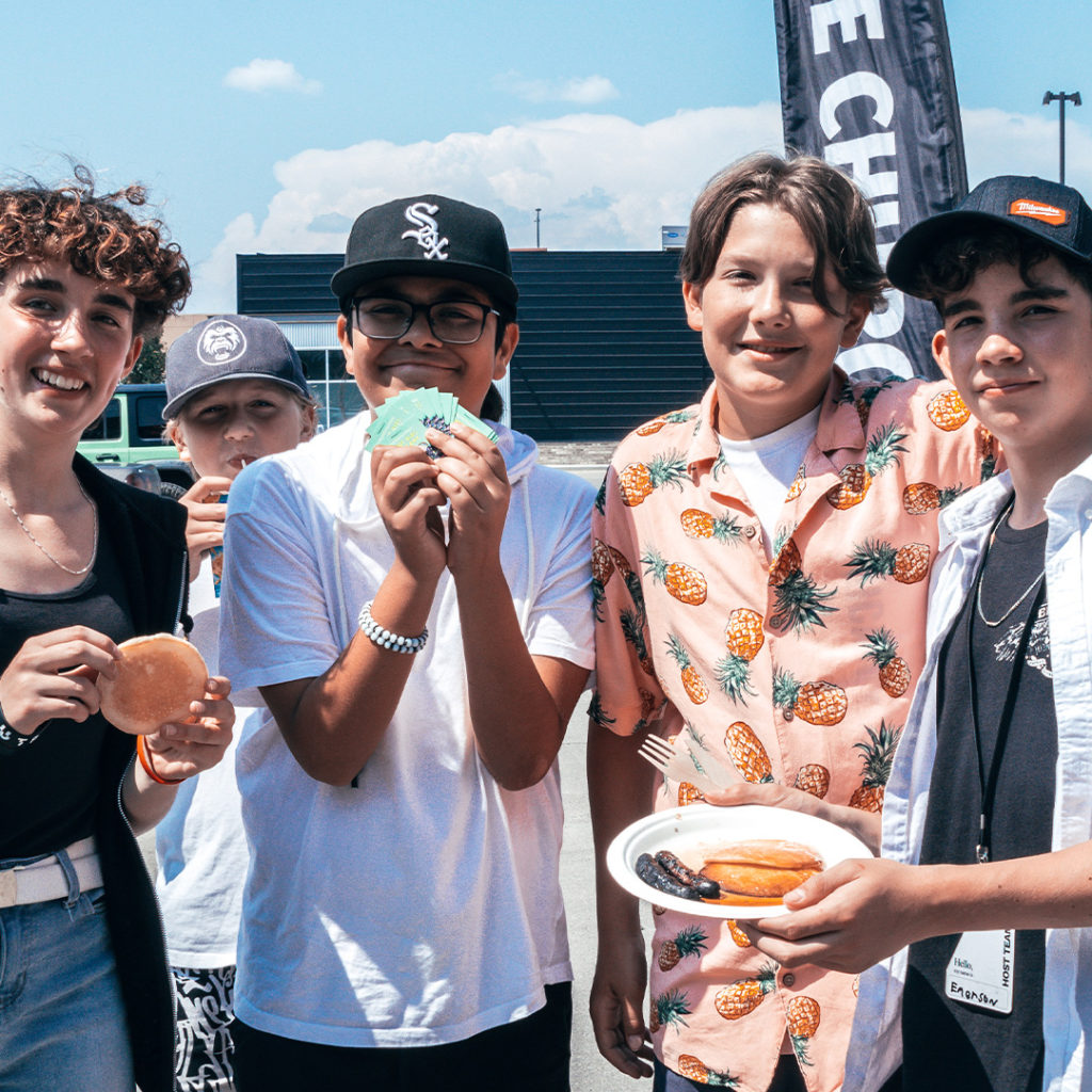 A group of teens posing for a photo