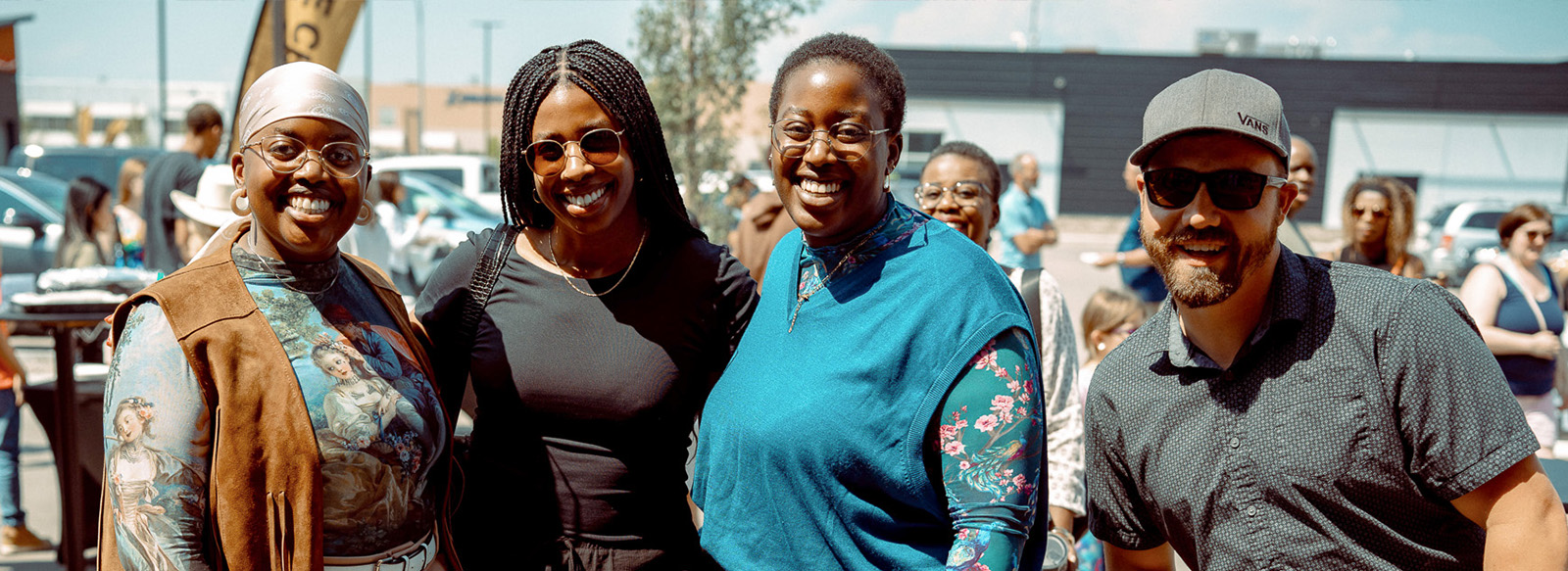 A group of people smiling at the camera