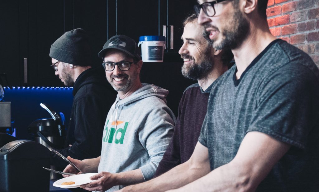 Men serving food at Venue Church